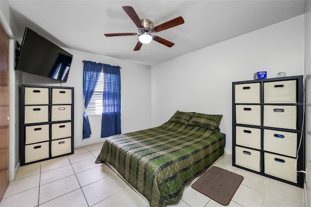 5107 Pine St, Seffner, FL 33584 - bedroom with light tile patterned flooring and a ceiling fan
