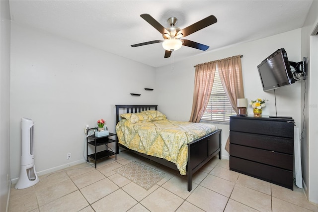 5107 Pine St, Seffner, FL 33584 - bedroom with light tile patterned floors and ceiling fan