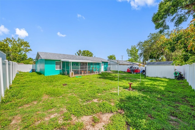 5107 Pine St, Seffner, FL 33584 - fenced backyard featuring a sunroom and a shed