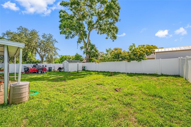 5107 Pine St, Seffner, FL 33584 - fenced backyard featuring a storage unit