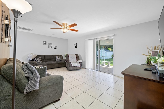 5107 Pine St, Seffner, FL 33584 - living room featuring a ceiling fan and light tile patterned floors