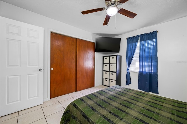 5107 Pine St, Seffner, FL 33584 - bedroom with light tile patterned floors, a closet, and ceiling fan