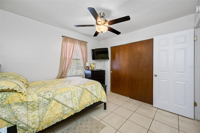 5107 Pine St, Seffner, FL 33584 - bedroom with a closet, light tile patterned floors, and a ceiling fan