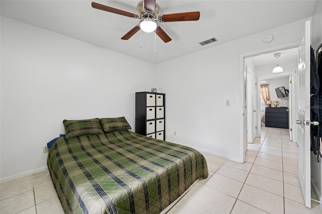 5107 Pine St, Seffner, FL 33584 - bedroom featuring light tile patterned flooring and ceiling fan