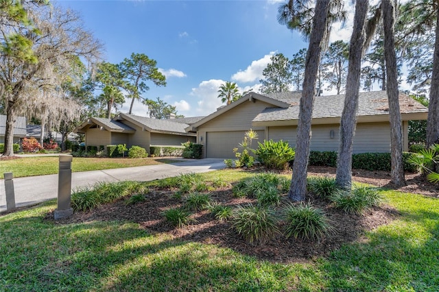 5340 Cobblestone Ct, Wesley Chapel, FL 33543 - ranch-style house with a garage, driveway, and a front lawn