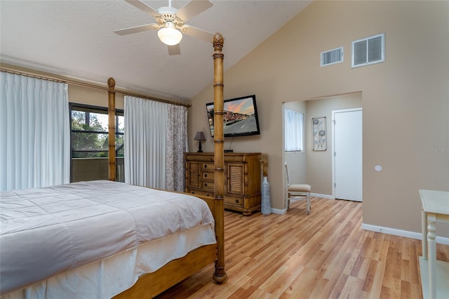 5340 Cobblestone Ct, Wesley Chapel, FL 33543 - bedroom with high vaulted ceiling, light wood finished floors, and a ceiling fan