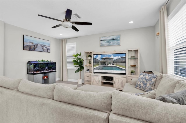 12382 Tibbetts St, Odessa, FL 33556 - living area featuring a ceiling fan and recessed lighting