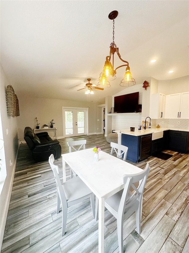 19743 Ellendale Dr, Land O Lakes, FL 34638 - dining space with light wood-style flooring and a ceiling fan