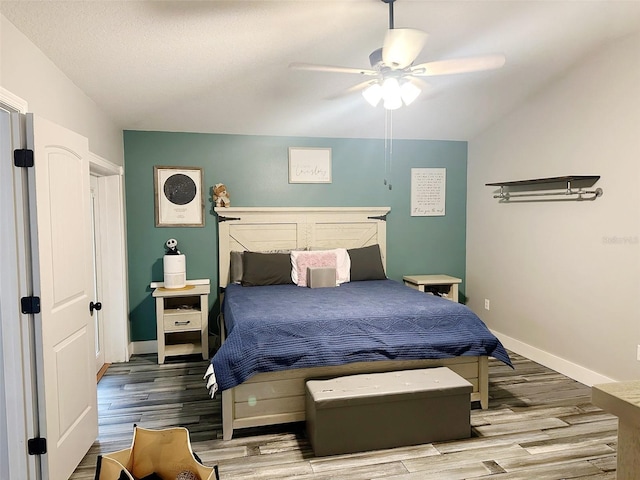 19743 Ellendale Dr, Land O Lakes, FL 34638 - bedroom featuring wood finished floors and ceiling fan