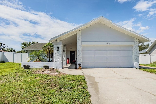 1304 Cedar Ct, Tarpon Springs, FL 34689 - ranch-style house with concrete driveway and an attached garage