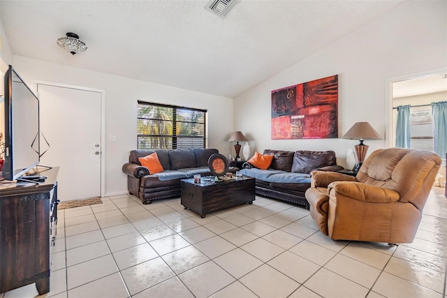 1304 Cedar Ct, Tarpon Springs, FL 34689 - living room featuring lofted ceiling and light tile patterned floors