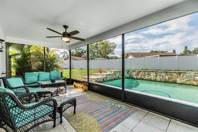 1304 Cedar Ct, Tarpon Springs, FL 34689 - sunroom / solarium featuring an outdoor living space, ceiling fan, and healthy amount of natural light