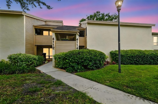 4114 Pinelake Ln Unit 202, Tampa, FL 33618 - view of property at dusk