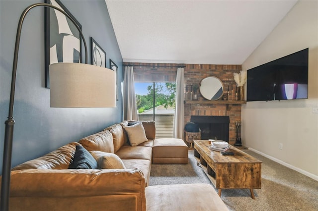4114 Pinelake Ln Unit 202, Tampa, FL 33618 - carpeted living room featuring lofted ceiling and a fireplace