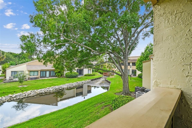 4114 Pinelake Ln Unit 202, Tampa, FL 33618 - view of grassy yard with a water view
