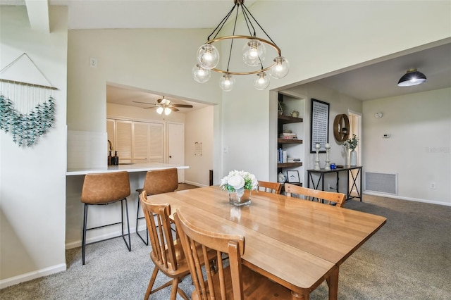 4114 Pinelake Ln Unit 202, Tampa, FL 33618 - carpeted dining space with a ceiling fan and a chandelier