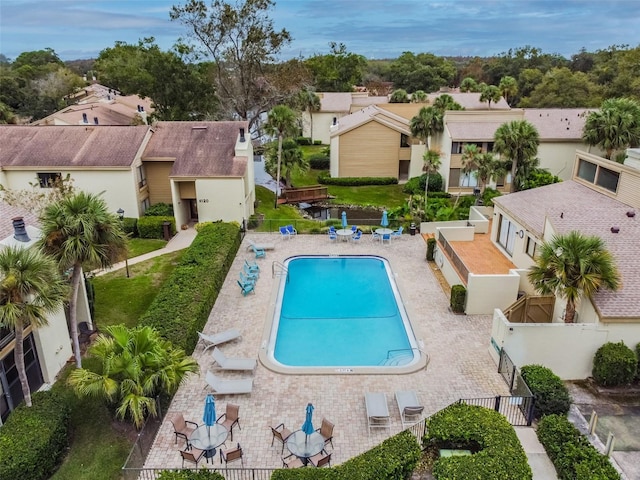 4114 Pinelake Ln Unit 202, Tampa, FL 33618 - community pool with a residential view and a patio area