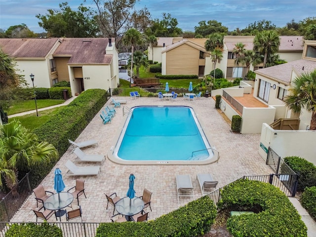 4114 Pinelake Ln Unit 202, Tampa, FL 33618 - community pool with a residential view and a patio area