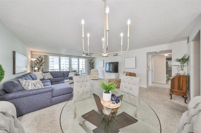 1591 Gulf Blvd Unit 304S, Clearwater Beach, FL 33767 - living room featuring a textured ceiling, a chandelier, and light colored carpet