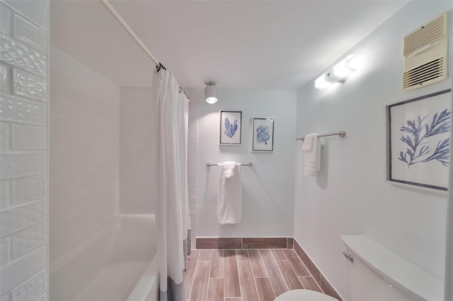 1591 Gulf Blvd Unit 304S, Clearwater Beach, FL 33767 - full bath with shower / tub combo with curtain and wood tiled floors