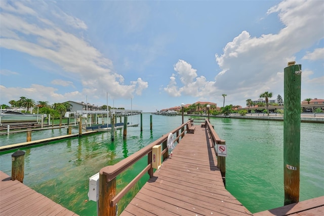 1591 Gulf Blvd Unit 304S, Clearwater Beach, FL 33767 - dock featuring a water view and boat lift