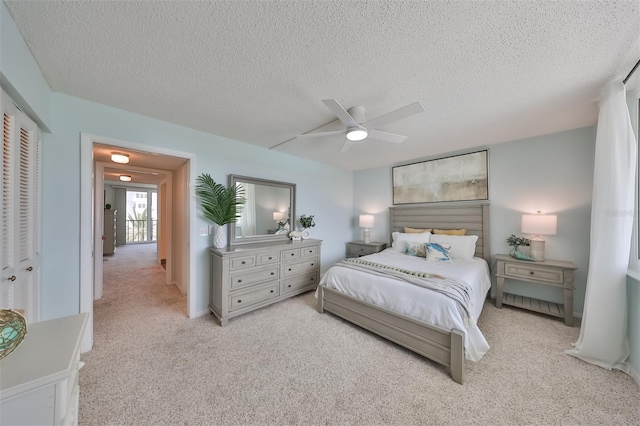1591 Gulf Blvd Unit 304S, Clearwater Beach, FL 33767 - carpeted bedroom featuring a textured ceiling and ceiling fan