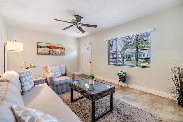 201 W Alva St, Tampa, FL 33603 - living area featuring a ceiling fan and tile patterned floors
