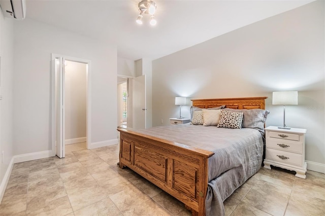 201 W Alva St, Tampa, FL 33603 - bedroom with a wall unit AC and baseboards