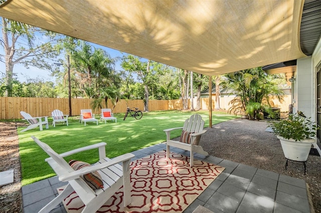 201 W Alva St, Tampa, FL 33603 - fenced backyard featuring a patio