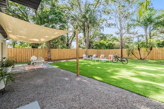 201 W Alva St, Tampa, FL 33603 - fenced backyard with a patio area