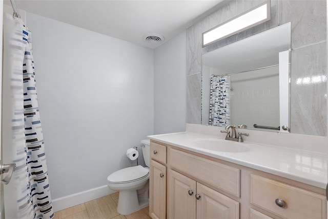 700 Beach Dr NE Unit 606, Saint Petersburg, FL 33701 - full bathroom featuring vanity, wood finished floors, and a shower with shower curtain