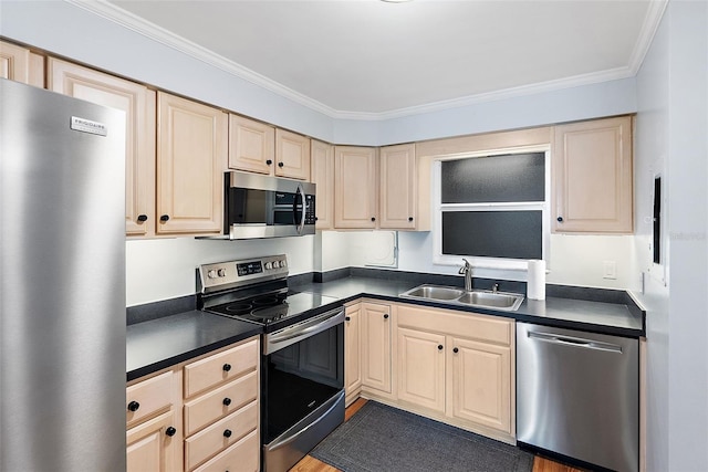 700 Beach Dr NE Unit 606, Saint Petersburg, FL 33701 - kitchen with appliances with stainless steel finishes, dark countertops, crown molding, cream cabinets, and light brown cabinets