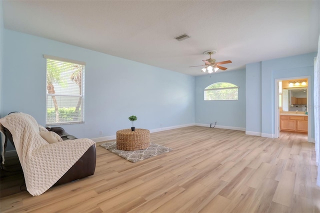 2228 Hannah Way S, Dunedin, FL 34698 - sitting room featuring light wood-style flooring and ceiling fan