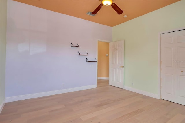 2228 Hannah Way S, Dunedin, FL 34698 - spare room featuring light wood-style flooring and ceiling fan