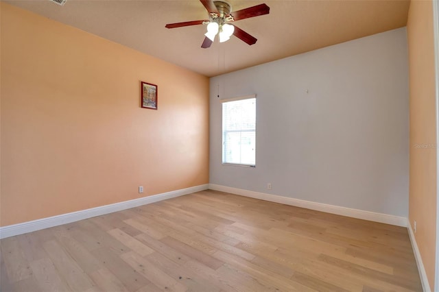 2228 Hannah Way S, Dunedin, FL 34698 - spare room with light wood finished floors and a ceiling fan