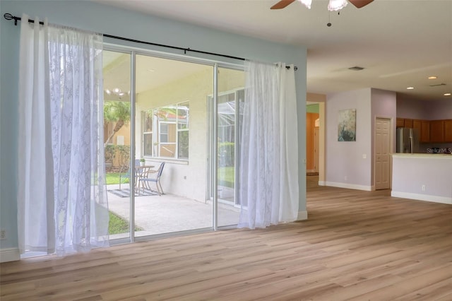 2228 Hannah Way S, Dunedin, FL 34698 - spare room with a ceiling fan, light wood-style floors, and recessed lighting