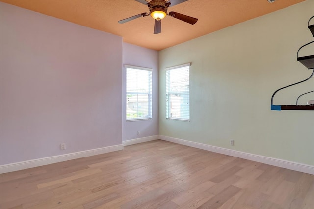 2228 Hannah Way S, Dunedin, FL 34698 - empty room with light wood-type flooring and a ceiling fan