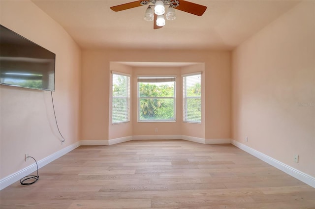 2228 Hannah Way S, Dunedin, FL 34698 - empty room featuring ceiling fan and light wood-type flooring