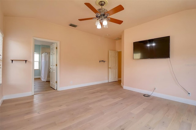 2228 Hannah Way S, Dunedin, FL 34698 - spare room with a ceiling fan and light wood-style flooring