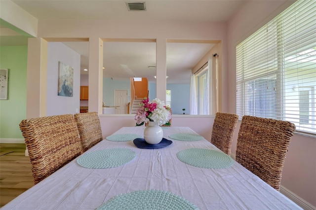 2228 Hannah Way S, Dunedin, FL 34698 - dining space with wood finished floors and baseboards