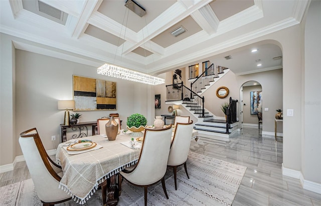 29038 Picana Ln, Wesley Chapel, FL 33543 - dining area featuring arched walkways, coffered ceiling, crown molding, stairway, and beam ceiling