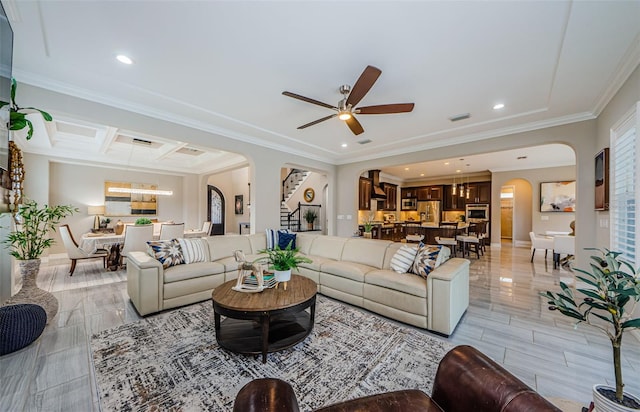 29038 Picana Ln, Wesley Chapel, FL 33543 - living area featuring arched walkways, ornamental molding, a ceiling fan, and recessed lighting