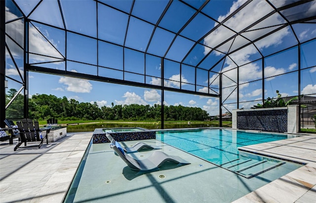 29038 Picana Ln, Wesley Chapel, FL 33543 - view of pool with a patio area, a pool with connected hot tub, and view of wooded area