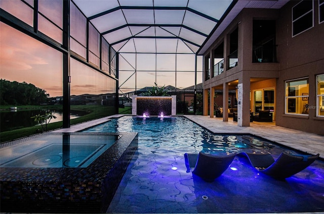 29038 Picana Ln, Wesley Chapel, FL 33543 - view of swimming pool with a patio area, a pool with connected hot tub, and glass enclosure