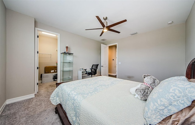 29038 Picana Ln, Wesley Chapel, FL 33543 - bedroom with light colored carpet and a ceiling fan
