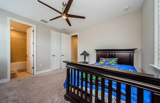 29038 Picana Ln, Wesley Chapel, FL 33543 - bedroom featuring carpet floors, ceiling fan, and ensuite bathroom