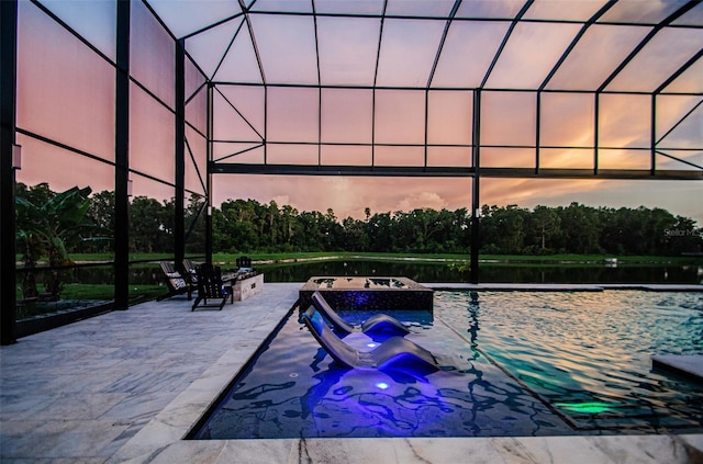 29038 Picana Ln, Wesley Chapel, FL 33543 - view of pool featuring a pool with connected hot tub, a water view, and a patio area