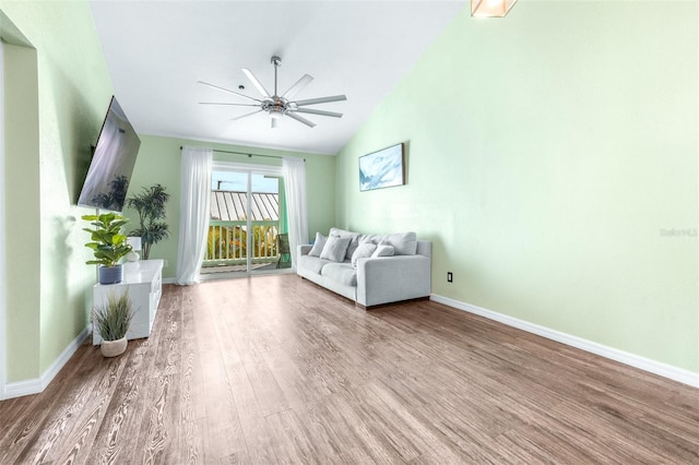 3002 W Cleveland St Unit B9, Tampa, FL 33609 - sitting room with a ceiling fan, wood finished floors, and lofted ceiling