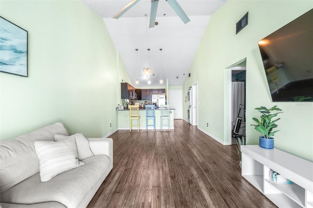 3002 W Cleveland St Unit B9, Tampa, FL 33609 - living area with dark wood-style floors, high vaulted ceiling, and a ceiling fan