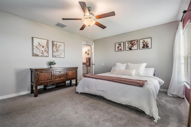 9839 Lemon Drop Loop, Sun City Center, FL 33573 - bedroom featuring carpet floors and a ceiling fan